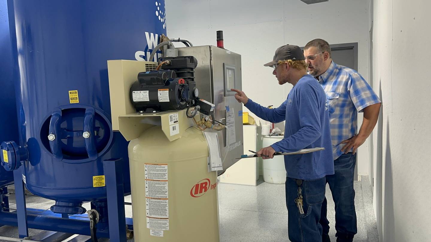 Eric Zeddies, Aqua System Operator Trainee and Jim Tonias, Aqua Team Lead, with Aqua Illinois at the water plant for Eastwood Manor, outside of McHenry. The 70-year-old system went live with iron filtration on Friday, Aug. 8, 2025.