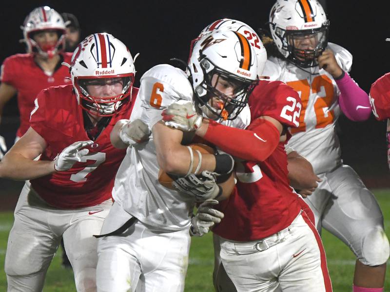 Oregon's Ethan Reed tackles Winnebago's Cooper Larson on Friday, Oct. 17, 2025 at Landers-Loomis Field in Oregon.