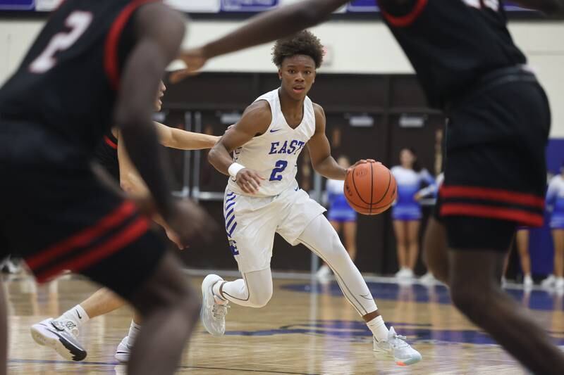 Lincoln-Way East’s BJ Powell looks for a play against Bolingbrook on Tuesday, Dec.12th, 2023 in Frankfort.