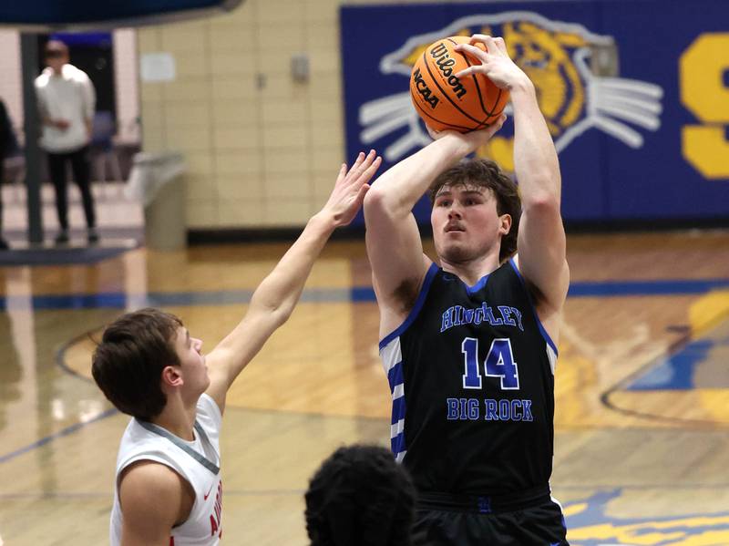 Hinckley-Big Rock's Martin Ledbetter shoots over a pair of Aurora Christian defenders during their sectional final game Friday, March 7, 2025, at Somonauk High School.