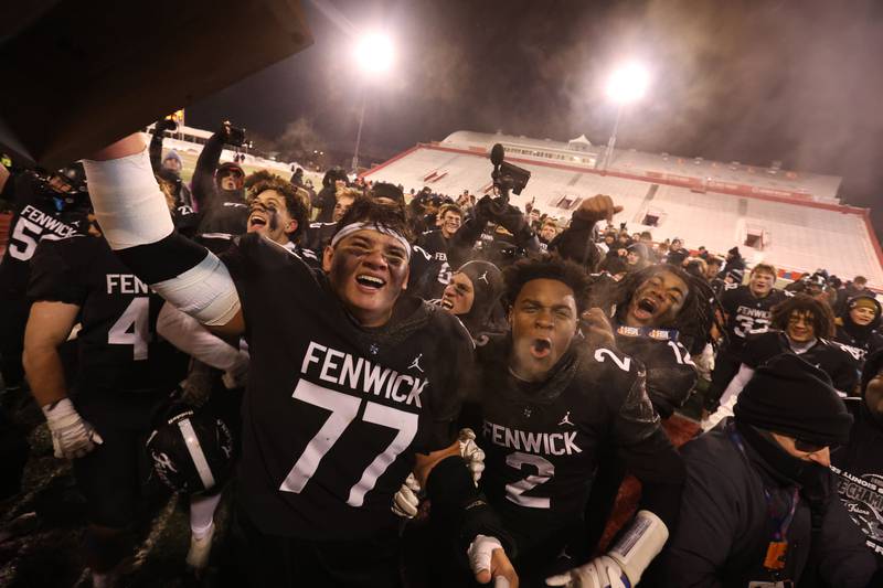Fenwick's Logan Schultz and Josh Morgan react after winning the Class 6A State championship game on Tuesday, Dec. 2, 2025 in Hancock Stadium at Illinois State University in Normal.