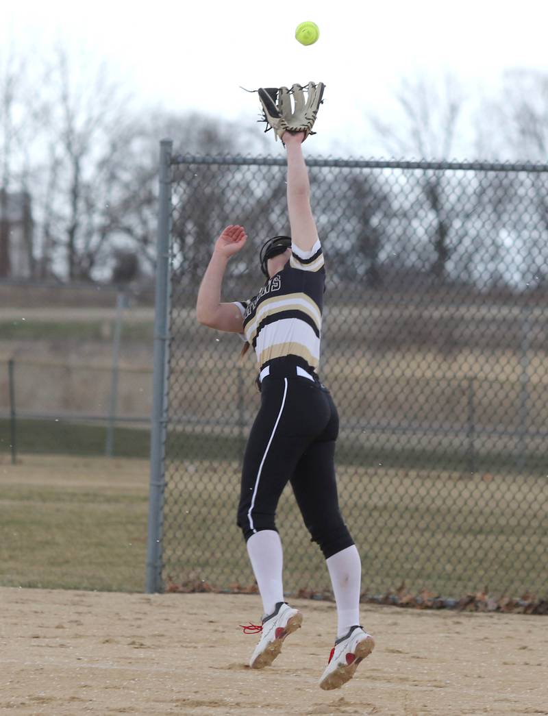 Sycamore first baseman Brooklynn Snodgrass reaches for a popup during their game against Harlem Friday, March 25, 2022, at the Sycamore Community Sports Complex.