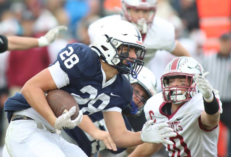 Cary-Grove’s Brady Elbert runs the ball against Antioch in IHSA Class 6A second-round playoff football action on Saturday, Nov. 9, 2024, at Al Bohrer Field on the campus of Cary-Grove High School in Cary..