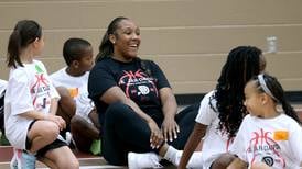 A’Jah Davis continues to score in life, helping next generation of hoopers
