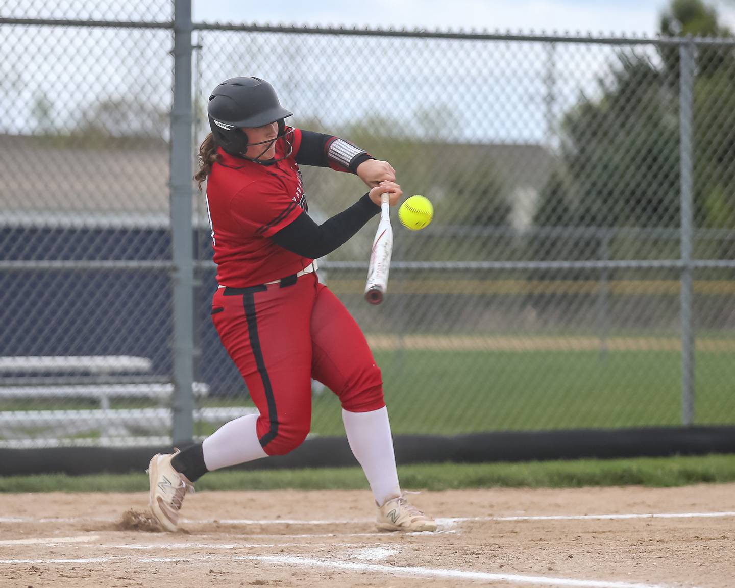 Yorkville's Kayla Kersting (10) swings at a pitch during softball game between Yorkville at Oswego East. April 17th, 2024.