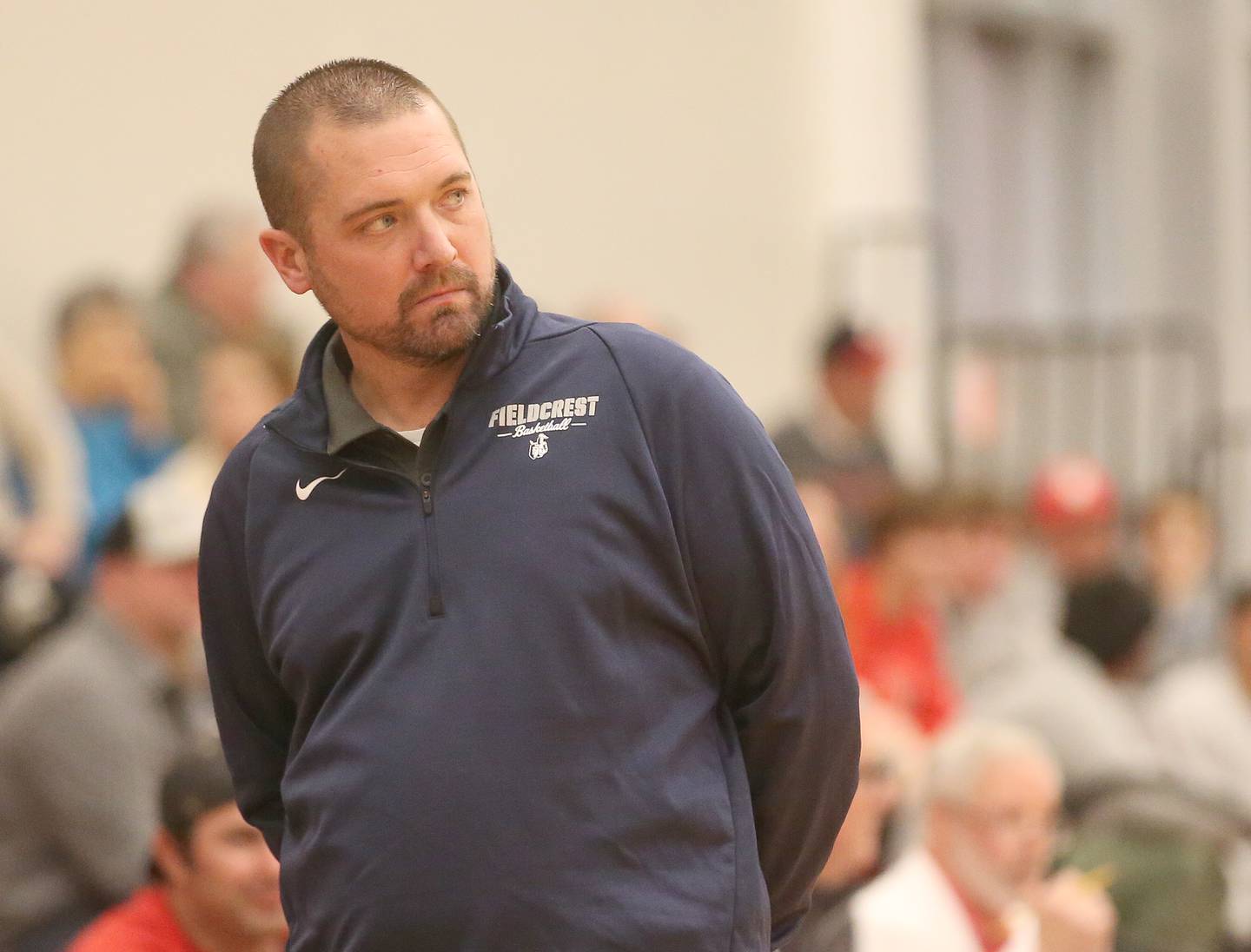 Fieldcrest head boys basketball coach Jermey Hahn watches his team play L-P during the 49th annual Colmone Classic on Friday, Dec. 8, 2023 at Hall High School.