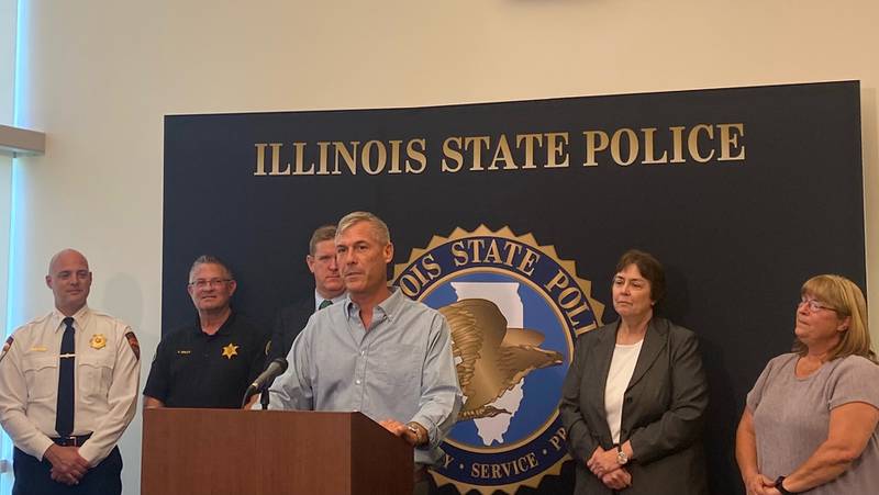 Grundy County Sheriff/Emergency Telephone System Director of Electronic Operations Chris Kindelspire speaks during Tuesday afternoon's ISP press conference.