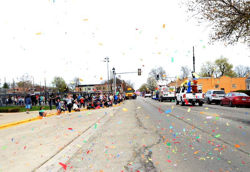 Confetti flies through the streets during District 98's Dia de los Niños parade Friday April 29, 2022.
