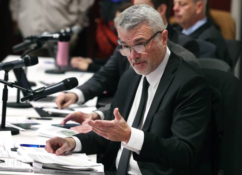 DeKalb City Planner Dan Olson speaks Monday, Dec. 1, 2025, about the proposed 560-acre Endeavour Energy data center during the Planning and Zoning Commission hearing at the DeKalb Public Library.