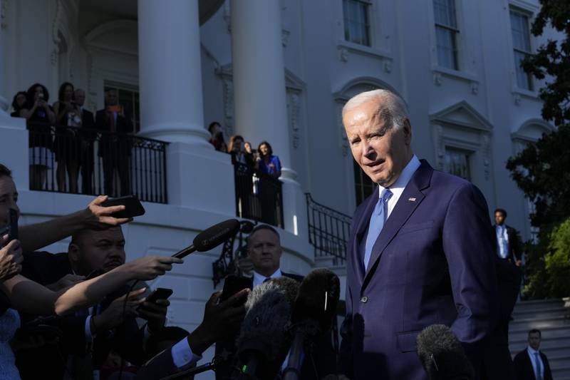 FILE - President Joe Biden talks with reporters before boarding Marine One on the South Lawn of the White House in Washington, Friday, May 26, 2023, as he heads to Camp David for the weekend. Biden and House Speaker Kevin McCarthy reached an “agreement in principle” to raise the nation’s legal debt ceiling late Saturday as they raced to strike a deal to limit federal spending and avert a potentially disastrous U.S. default.