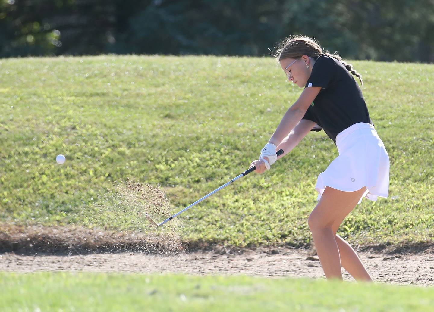 La Salle-Peru's Delani Duggan hits out of a bunker during an Interstate 8 Conference dual against Ottawa on Wednesday, Sept. 13, 2023 at Senica's Oak Ridge Golf Course in La Salle.