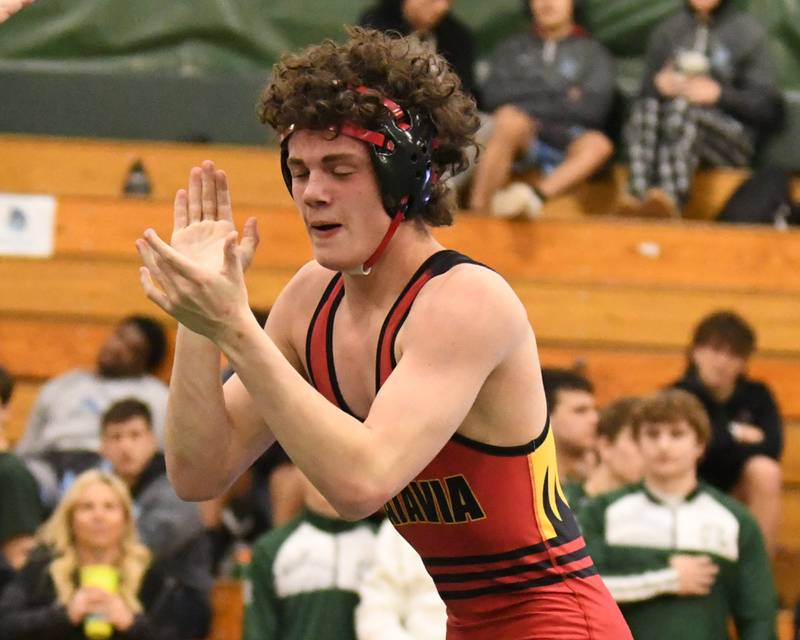 Jack Duraski celebrates his win over Glenbard West wrestler Ulises Rosas in the  132 weight class regional title match on Saturday Feb. 3, 2024 held at Glenbard West High School.