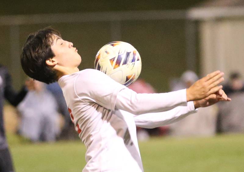 Ottawa's Luca Fernandez uses his chest to knock the ball down during the Class 2A Regional semifinal game on Monday, Oct. 20, 2025 at Ottawa HIgh School.