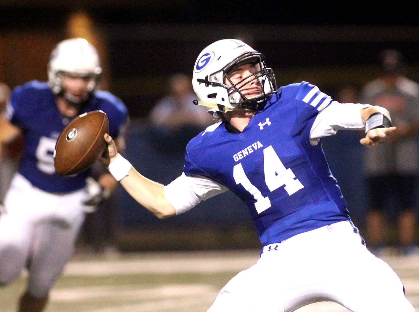 Geneva quarterback Alex Porter throws the ball during a home game against St. Charles East on Friday, Oct. 1, 2021.