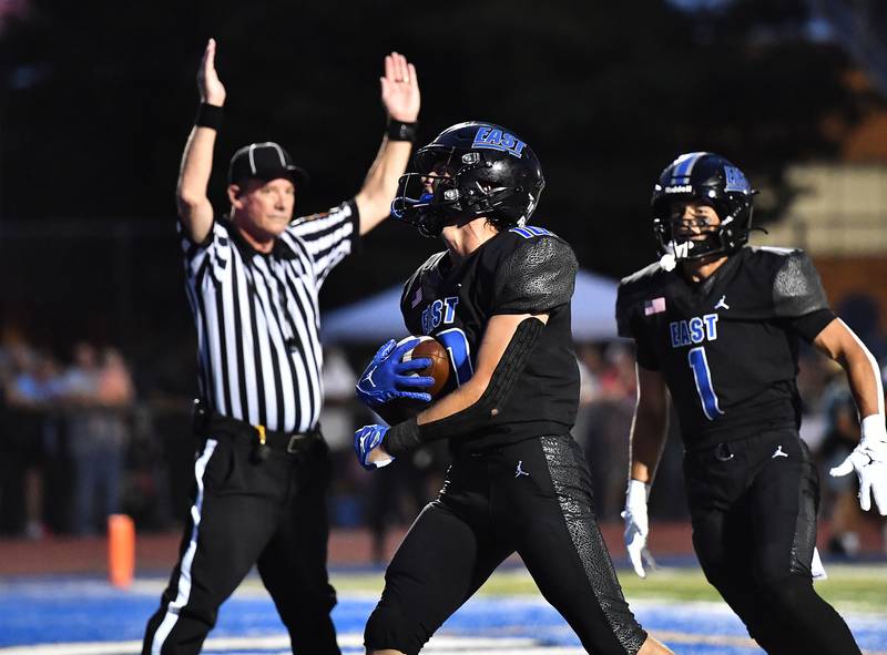 Lincoln-Way East's Mj Schley scores a touchdown during a non-conference game against Maine South on Friday, Aug. 30, 2024, at Frankfort. (Dean Reid for Shaw Local News Network)