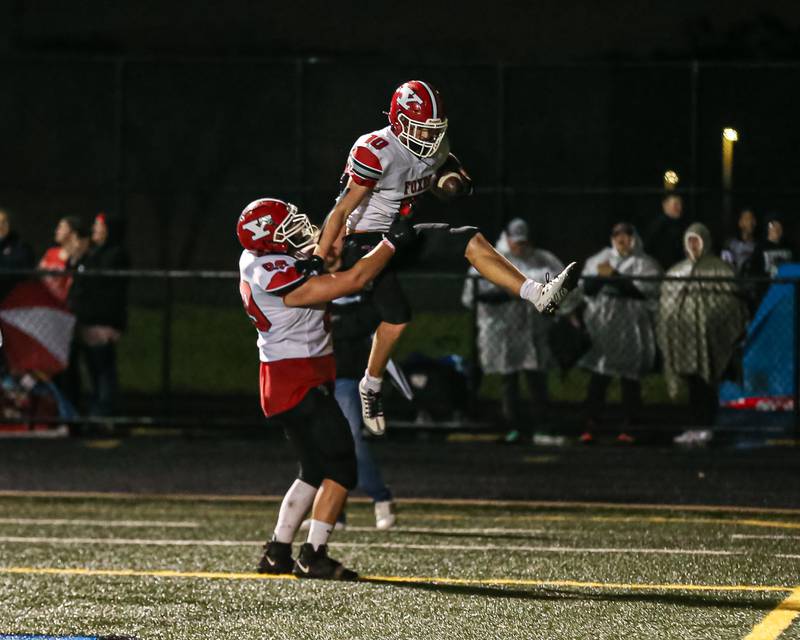 Yorkville's Luke Zook (10) celebrates a touchdown run during Class 7A football playoff game between Yorkville at Willowbrook.   Oct 27, 2023.