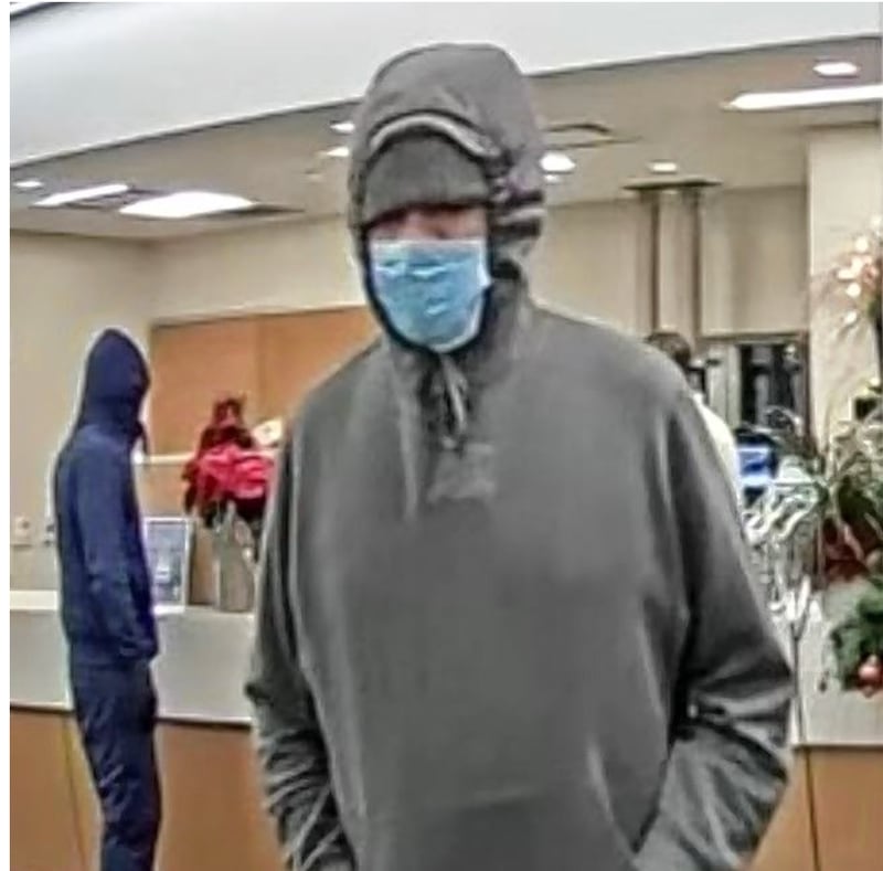 This man is one of two who police say robbed an Elmhurst bank Monday afternoon. (Courtesy of Elmhurst Police Department)