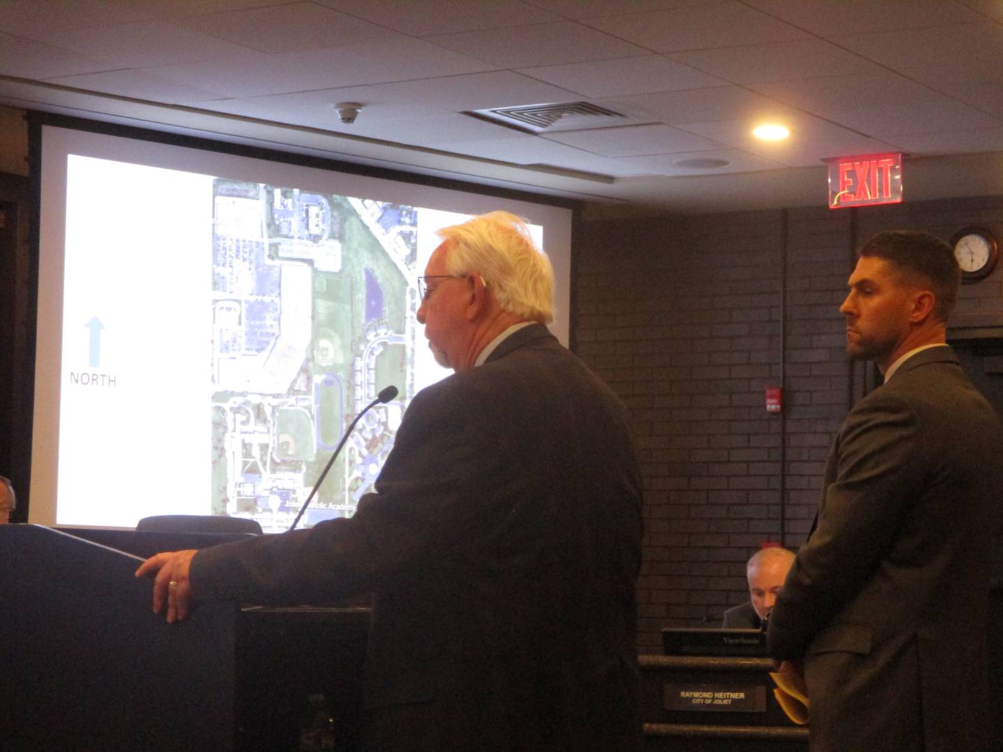 Attorney David Silverman (left) and Ryan Quigley, director of institutional advancement for Joliet Catholic Academy, speak to the Joliet Plan Commission on Thursday. Nov. 20, 2025