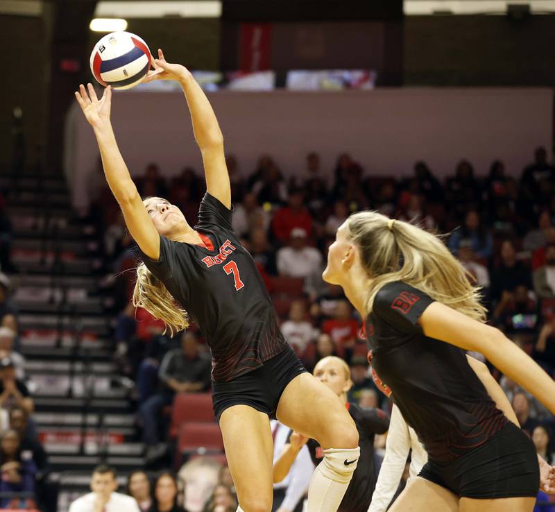 Benet Academy's Audrey Asleson (7) passes the ball to her teammate during the IHSA Class 4A girls volleyball championship match Saturday, Nov. 16, 2024 at CEFCU Arena in Normal.