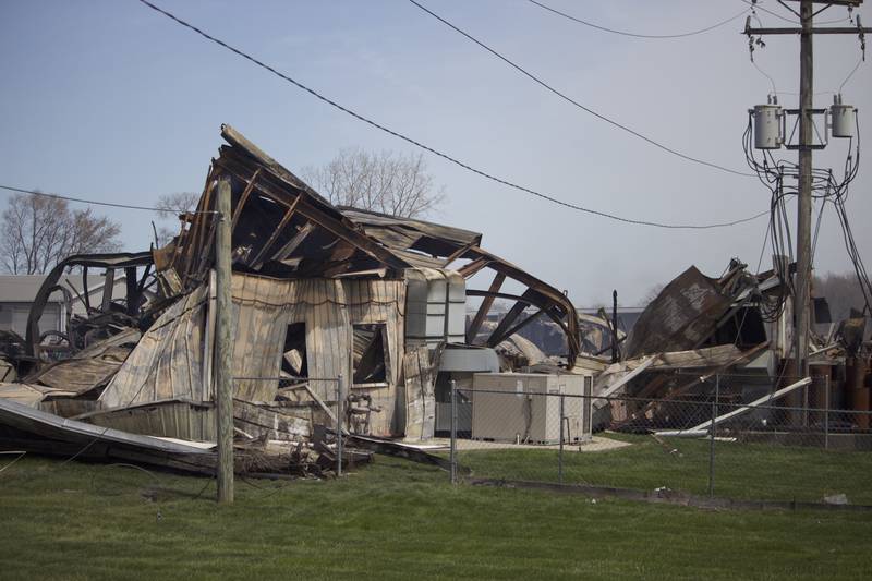 The wreckage from a fire on Monday, April 14, 2025, which destroyed a building at the site for Rovanco Piping Systems, 20535 SE Frontage Road, Joliet.