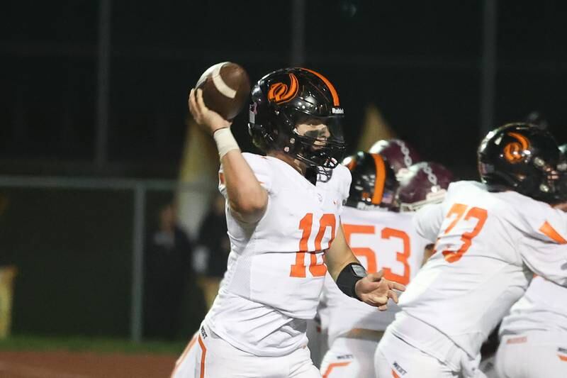 Lincoln-Way West’s Chase Hetfleisch passes for the 2-point conversion against Lockport on Friday, Oct. 18, 2024 in Lockport.