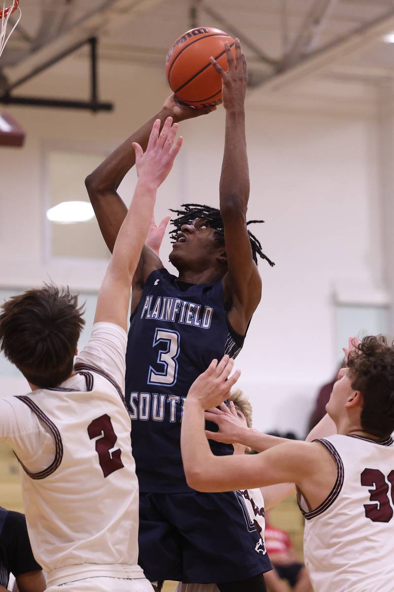Plainfield South’s Jermaine Theodore goes up for the shot against Lockport on Wednesday January 25th, 2023.