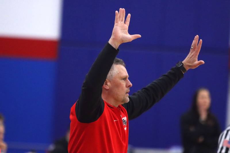Huntley’s Head Coach Steve Raethz guides the Red Raiders against Mundelein in varsity girls basketball Komaromy Classic tournament  action on Tuesday, Dec. 30, 2025, at Dundee-Crown High School in Carpentersville.