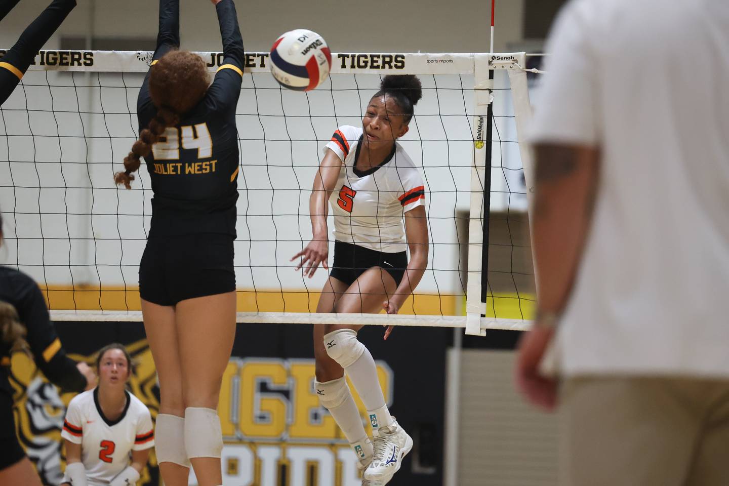 Minooka’s Brooklynne Brass powers a shot against Joliet West on Tuesday, Sept. 26, 2023 in Joliet.