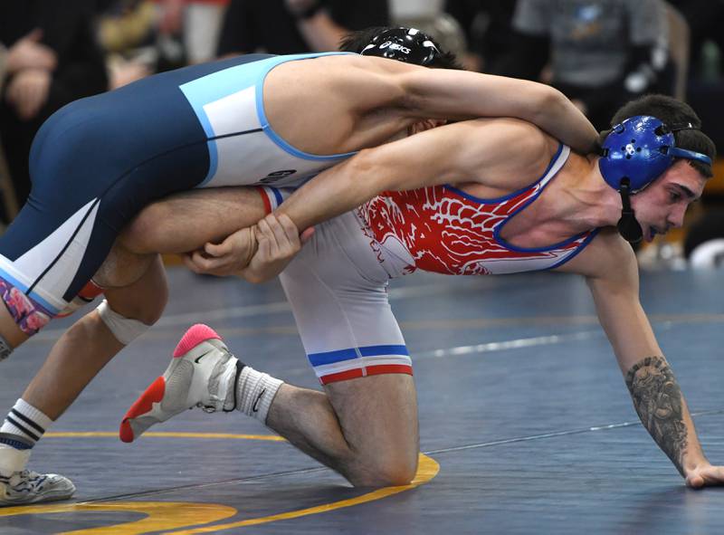 Oregon's Josiah Perez battles Guilford's Dominc Angileri in the 120-pound championship match at the Polo Wrestling Invitational on Saturday, Jan, 10, 2026 at Polo High School.
