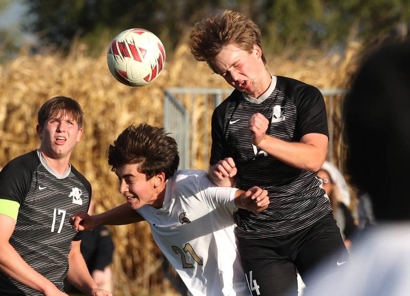 Sycamore's Leo Padilla and Kaneland's Nathan Scarpelli go up for a header during their game Monday, Oct. 7, 2024, at Kaneland High School in Maple Park.