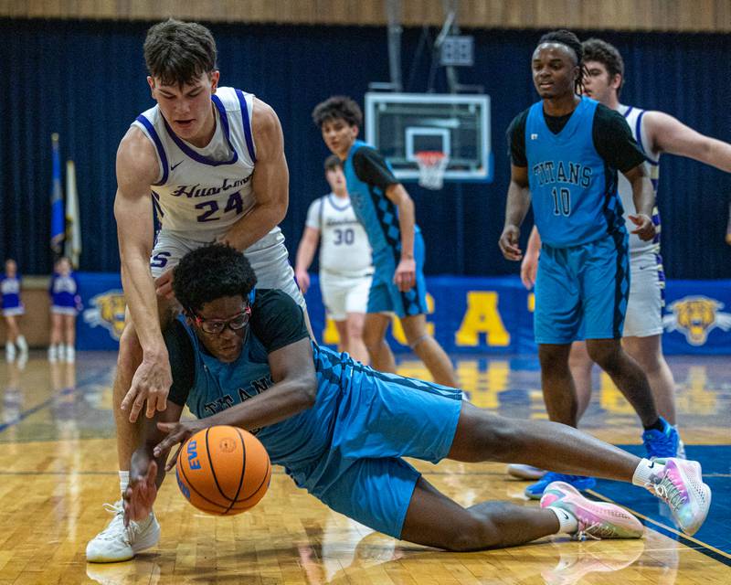 Lota Onwuameze (34) of IMSA dives for ball as Payton Twait (24) of Serena reaches in during the quarterfinals of the Little Ten Conference Tournament on Monday, Feb. 2, 2026 at Somonauk High School in Somonauk.
