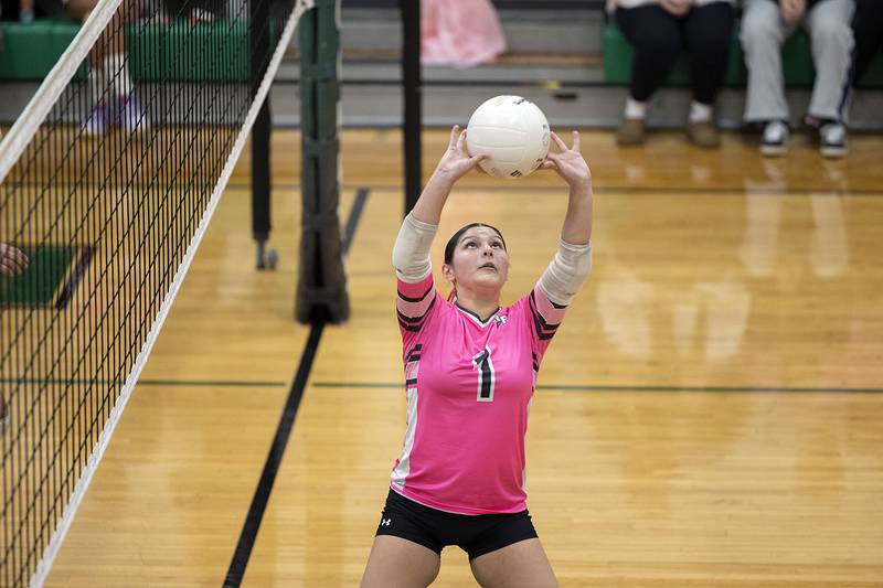 Rock Falls' Bre Dallgas-Frey sets the ball against North Boone Tuesday, Oct. 14, 2025.