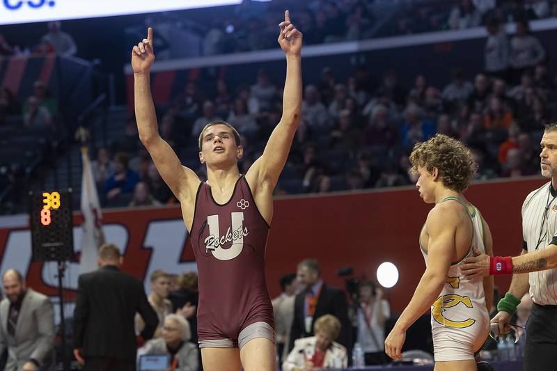 Taylor Finley of Unity Christian celebrates his win over Coal City’s Cody Widlowski in the 138 pound weight class of the 1A state individual wrestling finals Saturday, Feb. 22, 2025, at State Farm Center in Champaign.