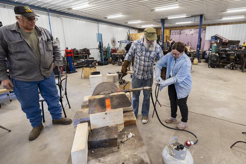 Stach’s wife Rene has been an integral part of the project to build a cross with the metal once thought to have been part of the 1873 Dixon bridge collapse.