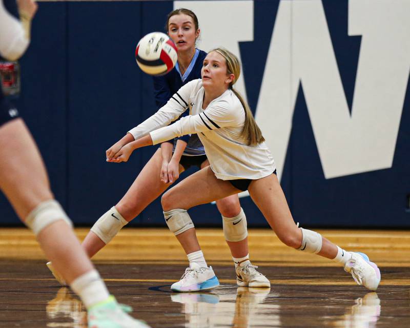 Nazareth's Reese Butkus (2) comes up with a dig off of a serve during volleyball match between Nazareth at IC Catholic Prep.  Aug 29, 2023.