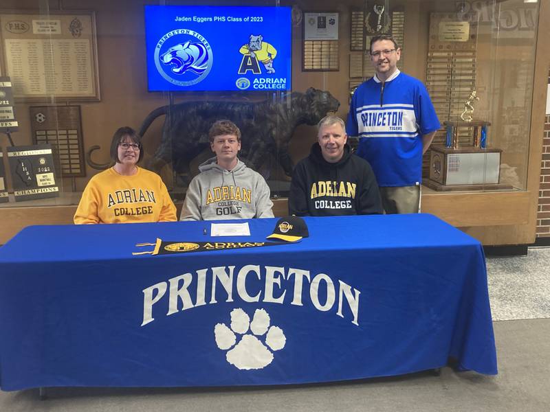 Princeton’s Jaden Eggers signs to play golf for Adrian (Mich.) College. He was joined by his parents, Karen and John, and PHS coach Brandon Crawford.