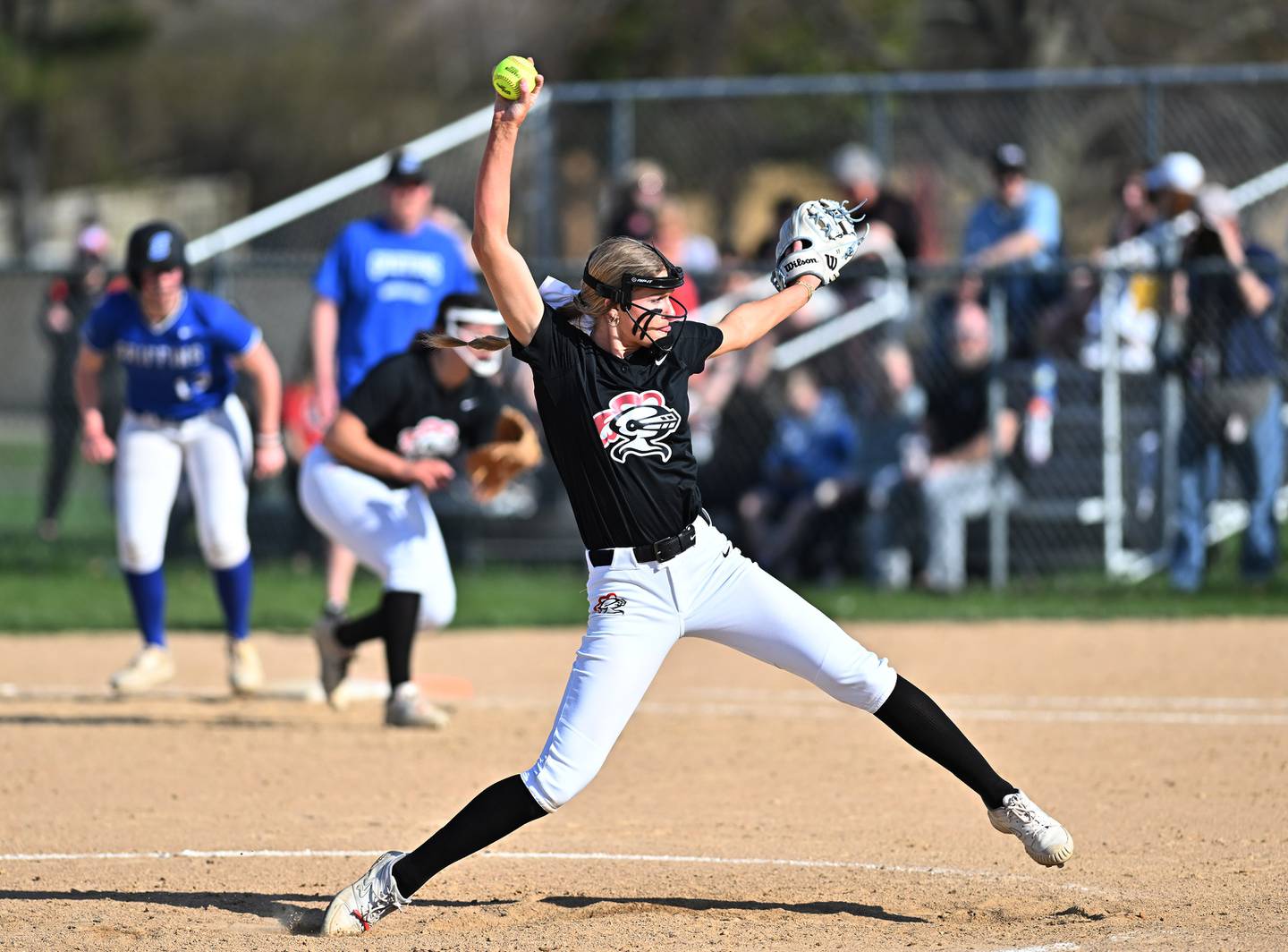 Lincoln-Way Central's Lisabella Dimitrijevic throws a pitch against Lincoln-Way East during the conference game on Tuesday, April. 11, 2023, at Frankfort.