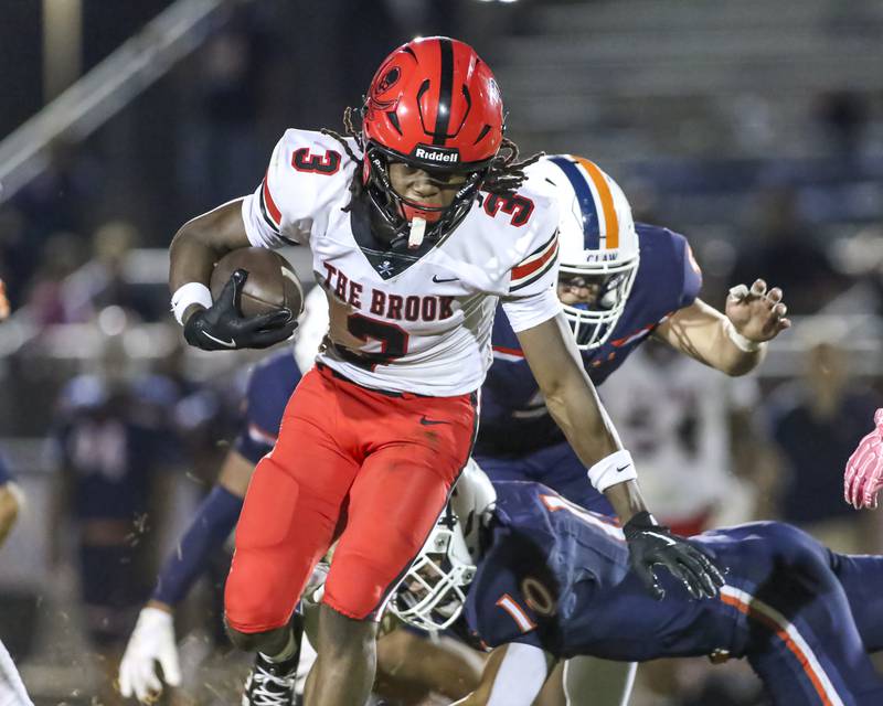 Bolingbrook's Jeremiah Jenkins (3) runs away from the defense during football game between Bolingbrook at Oswego Friday, Sept 12, 2025  in Oswego.
