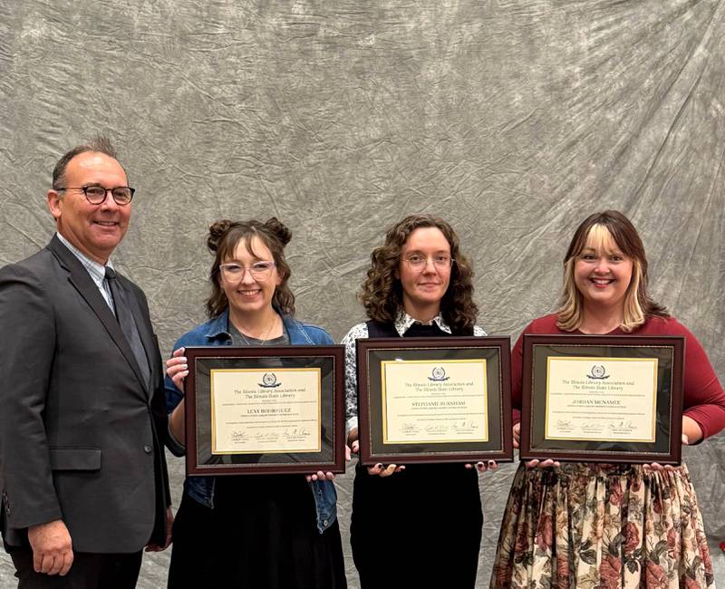 (From left) Greg McCormick, Illinois State Library; Lexy Rodriguez, Stephanie Burhnam, Jordan McNamee, Geneva Public Library, at the 2025 ILA Awards, Oct. 14, 2025
