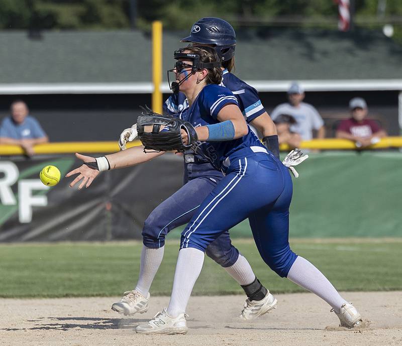 Princeton’s Sylvie Rutledge shovels the ball to second for an out against Bureau Valley slide in at second Friday, May 17, 2024 at the Class 2A regional semifinals in Rock Falls.