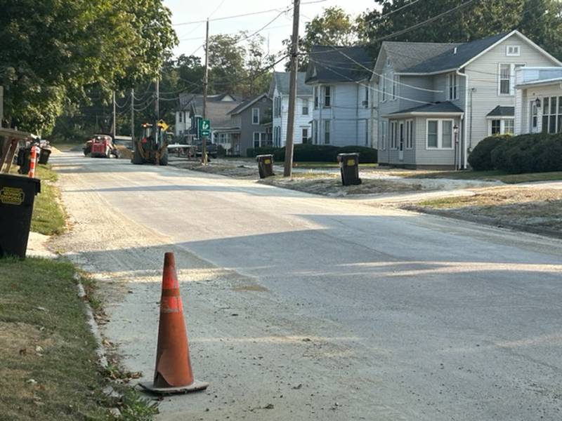 A gravel path runs in front of houses on the east side of Morrison's Illinois 78 as heavy equipment works at the north end of the road Tuesday, Aug. 29, 2023.