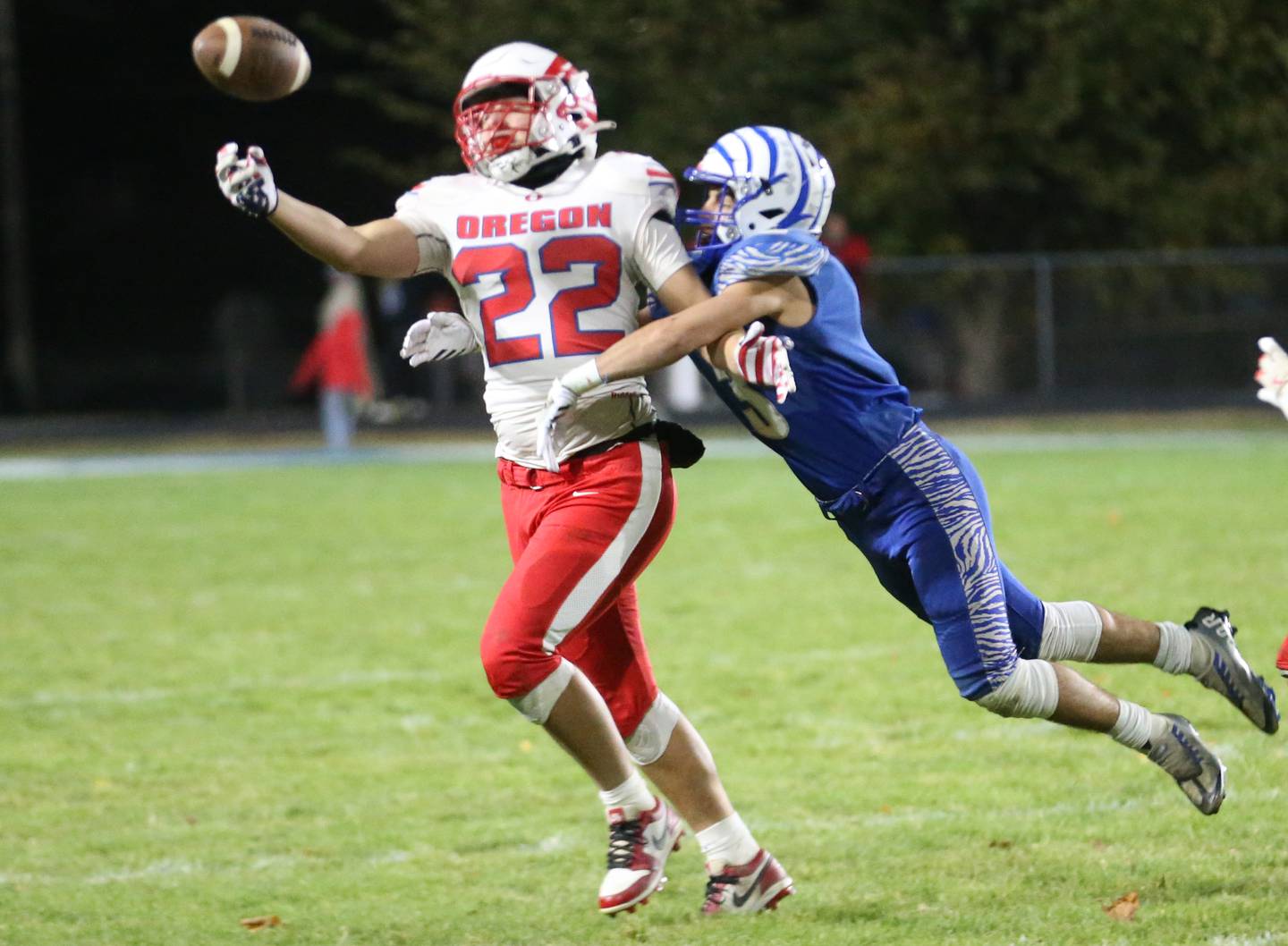 Princeton's Ace Christiansen breaks up a pass intended for Oregon's Kade Girton during the Class 3A playoff game on Friday, Nov. 1, 2024 at Princeton High School.