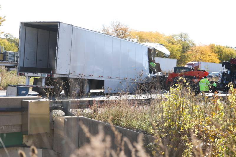 Workers continue to work on reopening I-55 hours after the wreck involving two semitrailers. A crash involving two semitrailers shutdown down southbound I-55 as diesel fuel, water bottles and soybeans covered all lanes of Interstate 55 south of the I-80 interchange early Wednesday morning.