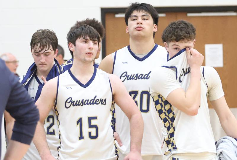 Marquette players walk off of the hardwood after falling to Indian Creek during the Class 1A Sectional game on Friday, March 6, 2026 at Amboy High School.