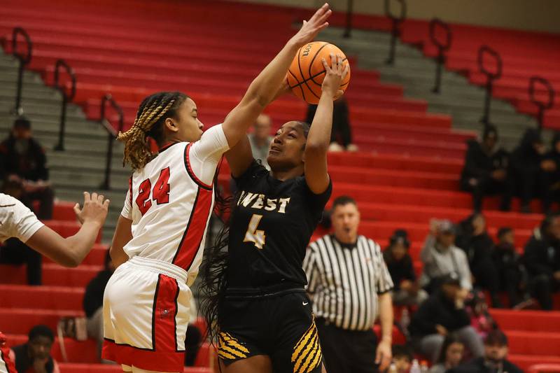 Joliet West’s Gabrielle Gavin puts up the contested shot against Bolingbrook on Thursday, Jan 23, 2025 in Bolingbrook.