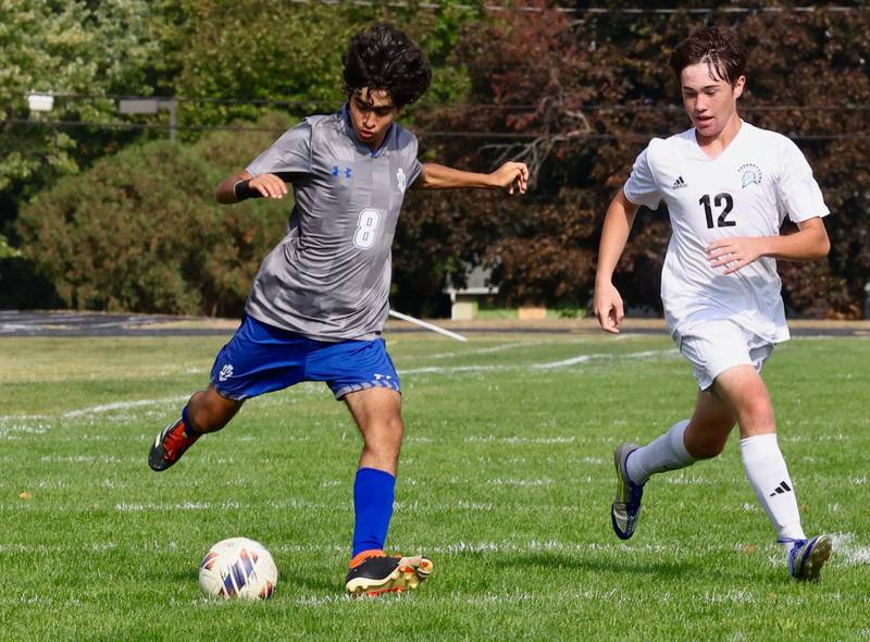 Princeton's Erfaan Yousufy takes a swing Saturday's regional quarterfinal soccer match vs. Stanford Olympia at Bryant Field. The Tigers won 6-2.