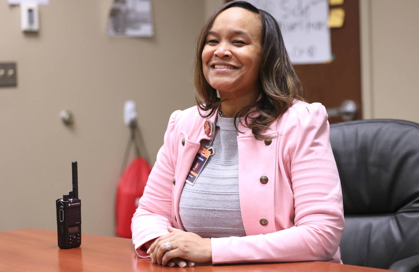 Treveda Redmond, principal at Huntley Middle School, smiles as she talks about her job Tuesday, March 14, 2023, at the school in DeKalb.