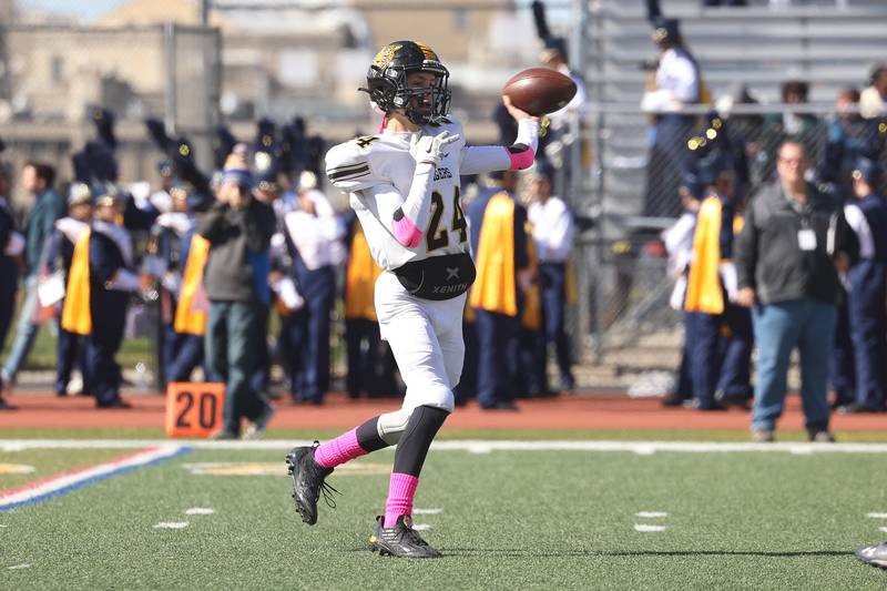 Joliet West’s Evan Gould passes against Joliet Central on Saturday.