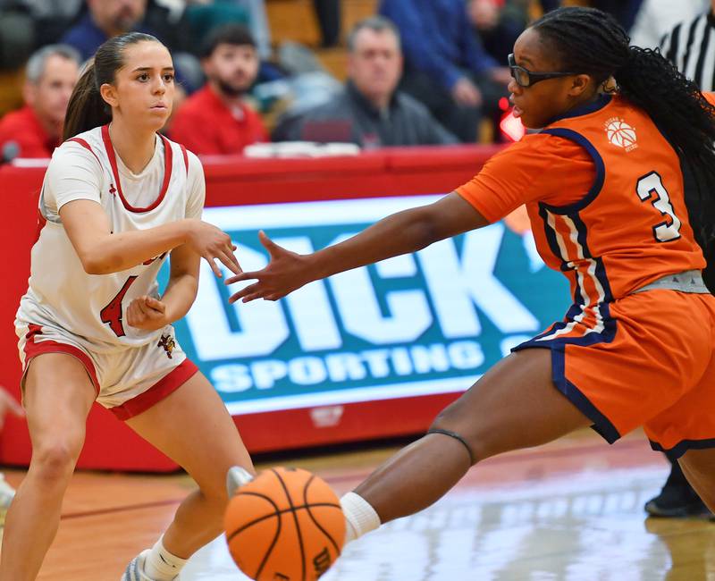 Benet’s Ava Messenger bounces a pass past Whitney Young’s Nina Lloyd (3) during a Coach Kipp Hoopsfest game on January 19, 2026 at Benet Academy in Lisle.