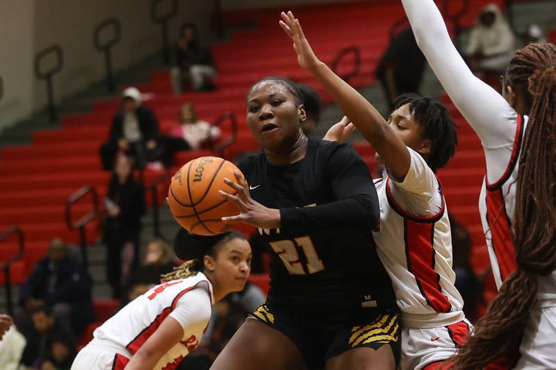 Joliet West’s Jada Thompson battles under the basket against Bolingbrook on Thursday, Jan 23, 2025 in Bolingbrook.
